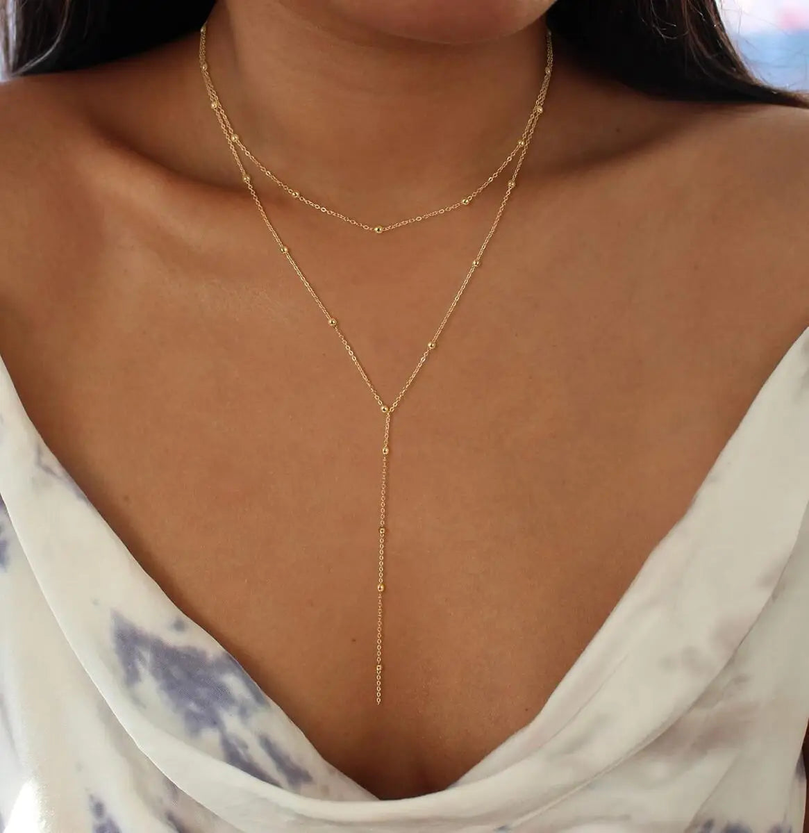 Collar largo con forma de Y