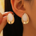 Pendientes elegantes con diseño de gotas